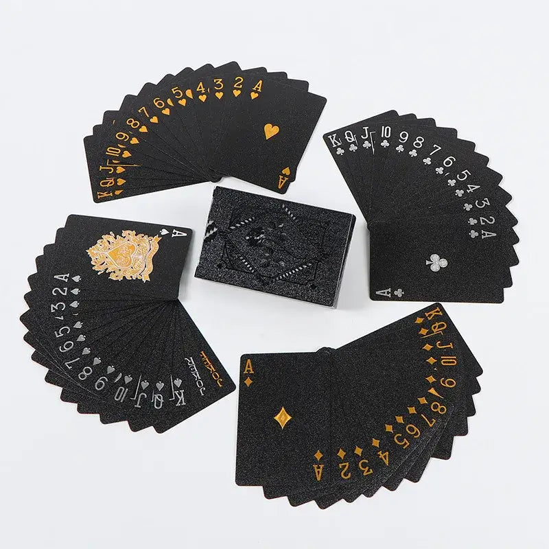 Waterproof black playing cards fanned out with golden accents, ideal for poker and magic games.